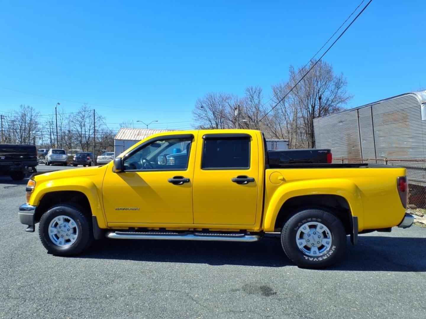 2005 Yellow GMC Canyon Z85 SLE (1GTDS136358) with an 3.5L 6 Cylinder Fuel Injected engine, 4-Speed Automatic transmission, located at 50 Eastern Blvd., Essex, MD, 21221, (410) 686-3444, 39.304367, -76.484947 - Photo#1