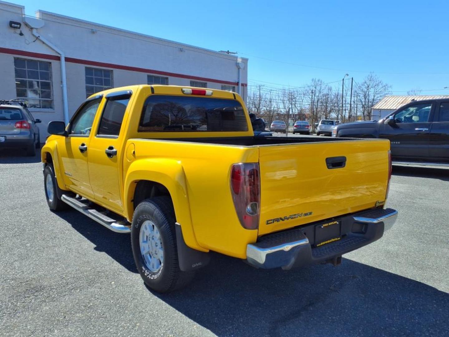 2005 Yellow GMC Canyon Z85 SLE (1GTDS136358) with an 3.5L 6 Cylinder Fuel Injected engine, 4-Speed Automatic transmission, located at 50 Eastern Blvd., Essex, MD, 21221, (410) 686-3444, 39.304367, -76.484947 - Photo#2