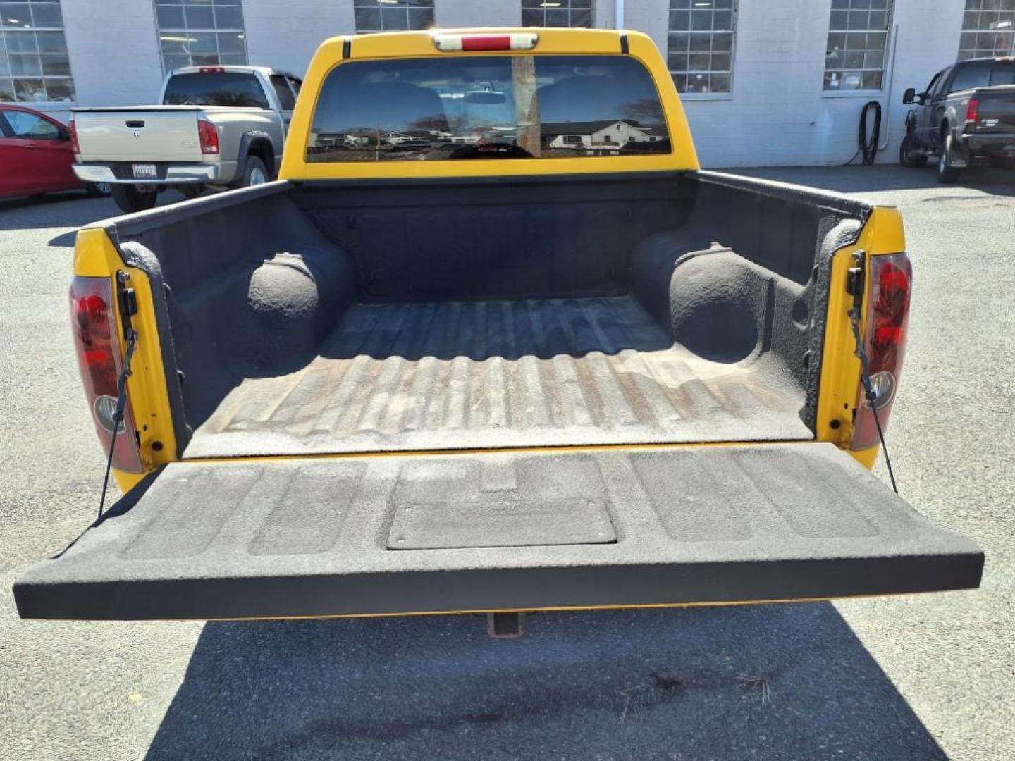 2005 Yellow GMC Canyon Z85 SLE (1GTDS136358) with an 3.5L 6 Cylinder Fuel Injected engine, 4-Speed Automatic transmission, located at 50 Eastern Blvd., Essex, MD, 21221, (410) 686-3444, 39.304367, -76.484947 - Photo#4