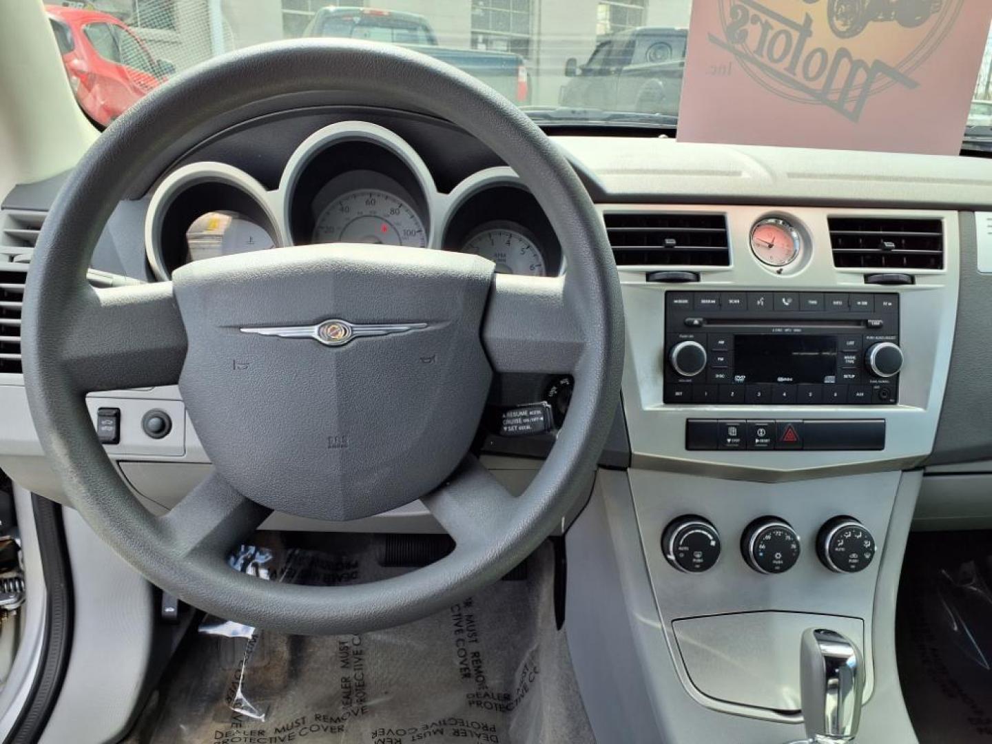2008 Silver Chrysler Sebring 2DRCV (1C3LC55RX8N) with an 2.7L 6 Cylinder Sequential-Port F.I. engine, Automatic transmission, located at 50 Eastern Blvd., Essex, MD, 21221, (410) 686-3444, 39.304367, -76.484947 - Photo#13