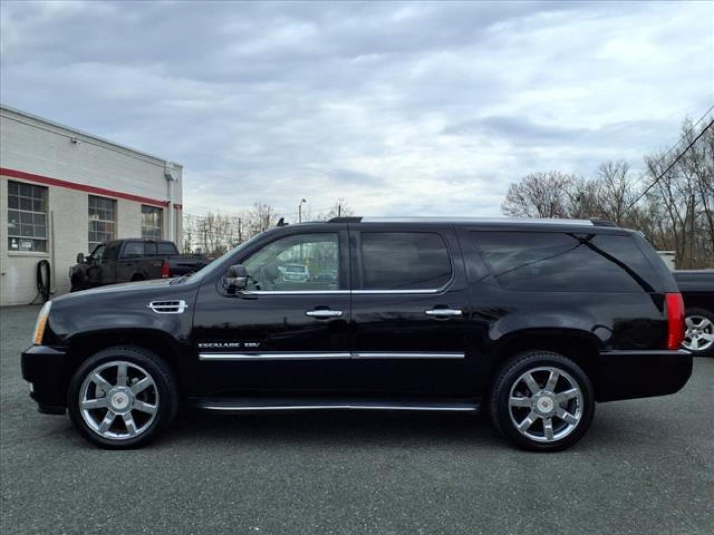 2013 Black Raven Cadillac Escalade ESV Luxury (1GYS4HEF0DR) with an 6.2L 8 Cylinder Sequential-Port F.I. engine, ATAWD transmission, located at 50 Eastern Blvd., Essex, MD, 21221, (410) 686-3444, 39.304367, -76.484947 - Photo#1