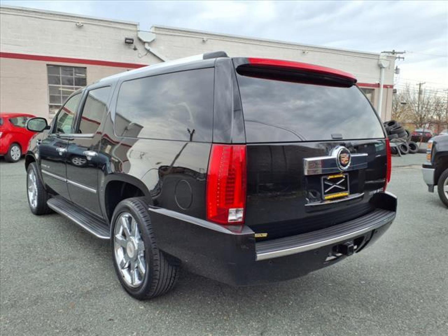 2013 Black Raven Cadillac Escalade ESV Luxury (1GYS4HEF0DR) with an 6.2L 8 Cylinder Sequential-Port F.I. engine, ATAWD transmission, located at 50 Eastern Blvd., Essex, MD, 21221, (410) 686-3444, 39.304367, -76.484947 - Photo#2