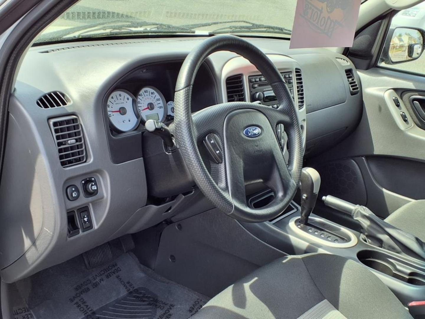 2007 Silver Metallic Clearcoat Ford Escape XLT (1FMYU93137K) with an 3.0L 6 Cylinder Fuel Injected engine, ATAWD transmission, located at 50 Eastern Blvd., Essex, MD, 21221, (410) 686-3444, 39.304367, -76.484947 - Photo#11