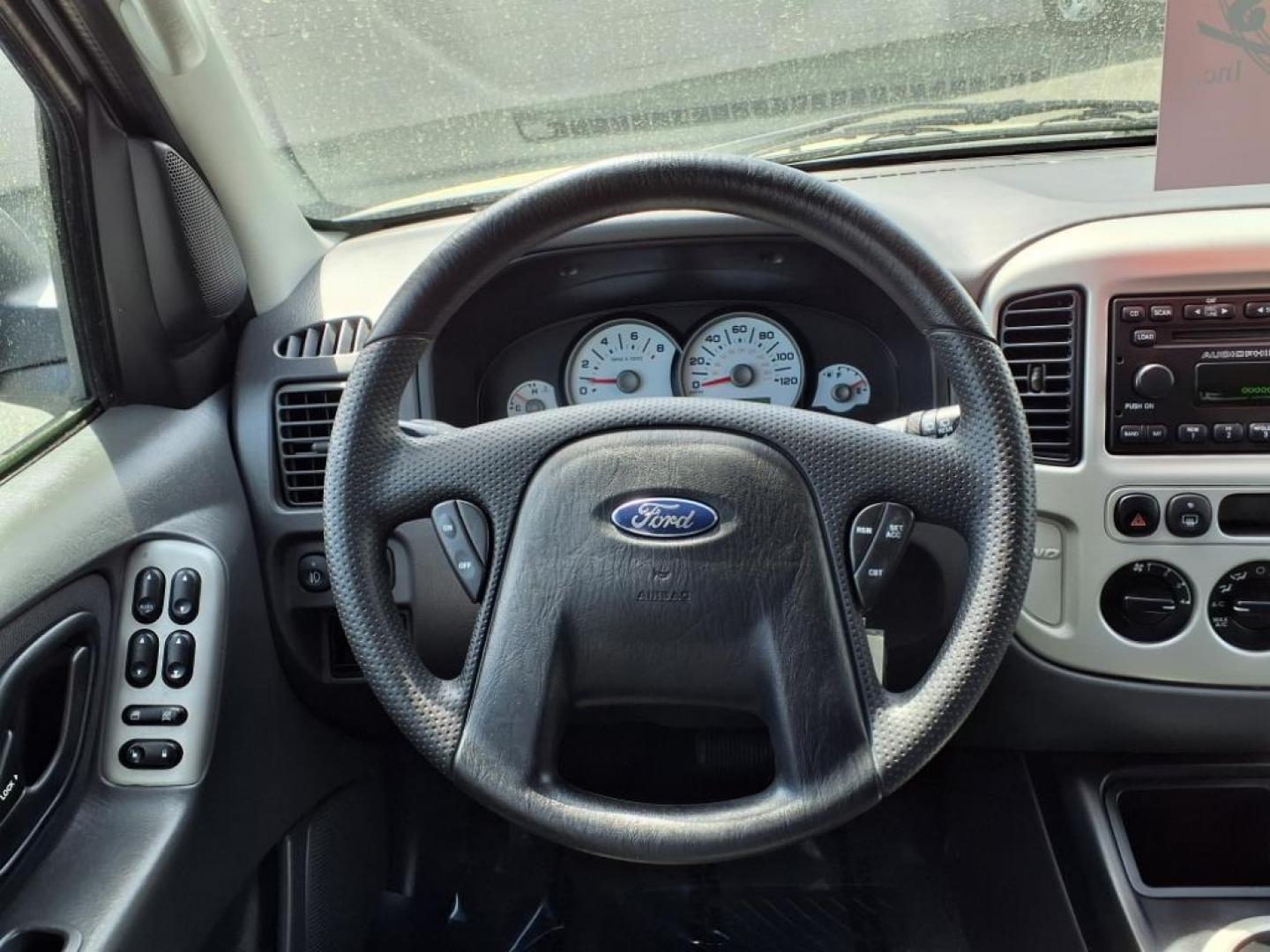 2007 Silver Metallic Clearcoat Ford Escape XLT (1FMYU93137K) with an 3.0L 6 Cylinder Fuel Injected engine, ATAWD transmission, located at 50 Eastern Blvd., Essex, MD, 21221, (410) 686-3444, 39.304367, -76.484947 - Photo#14