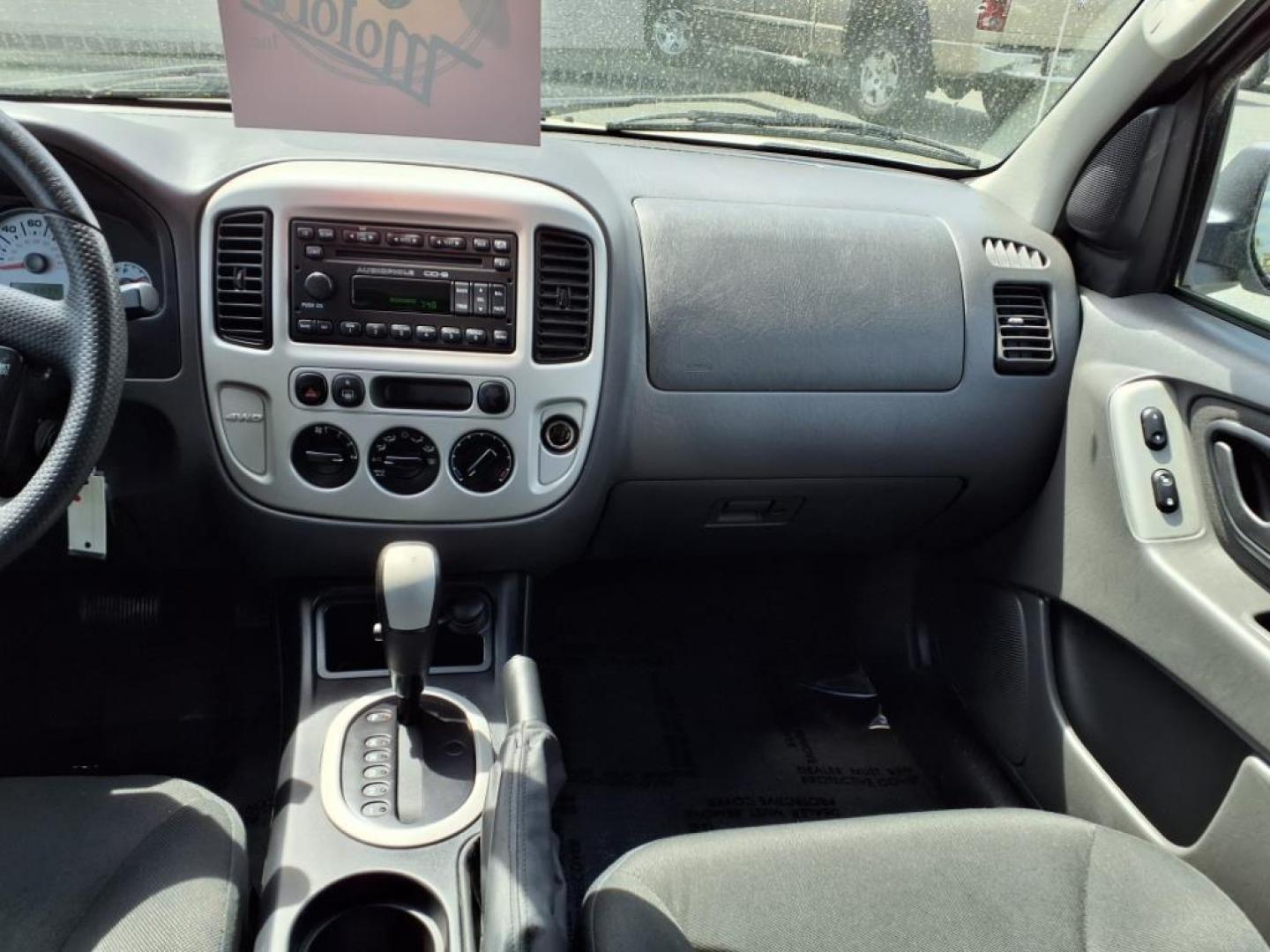 2007 Silver Metallic Clearcoat Ford Escape XLT (1FMYU93137K) with an 3.0L 6 Cylinder Fuel Injected engine, ATAWD transmission, located at 50 Eastern Blvd., Essex, MD, 21221, (410) 686-3444, 39.304367, -76.484947 - Photo#16
