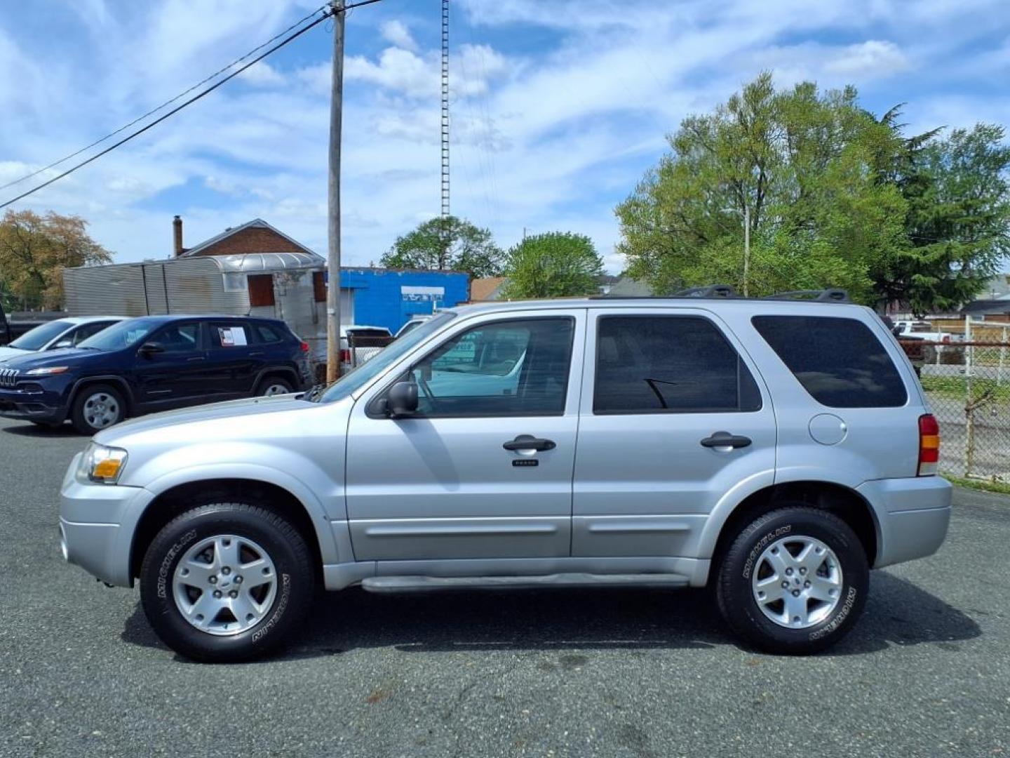 2007 Silver Metallic Clearcoat Ford Escape XLT (1FMYU93137K) with an 3.0L 6 Cylinder Fuel Injected engine, ATAWD transmission, located at 50 Eastern Blvd., Essex, MD, 21221, (410) 686-3444, 39.304367, -76.484947 - Photo#1