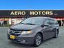 2015 Modern Steel Metallic Honda Odyssey Touring (5FNRL5H90FB) with an 3.5L 3.5L V6 248hp 250ft. lbs. Sequential-Port F.I. engine, 6-Speed Automatic transmission, located at 50 Eastern Blvd., Essex, MD, 21221, (410) 686-3444, 39.304367, -76.484947 - Photo#0