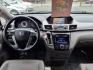 2015 Modern Steel Metallic Honda Odyssey Touring (5FNRL5H90FB) with an 3.5L 3.5L V6 248hp 250ft. lbs. Sequential-Port F.I. engine, 6-Speed Automatic transmission, located at 50 Eastern Blvd., Essex, MD, 21221, (410) 686-3444, 39.304367, -76.484947 - Photo#17