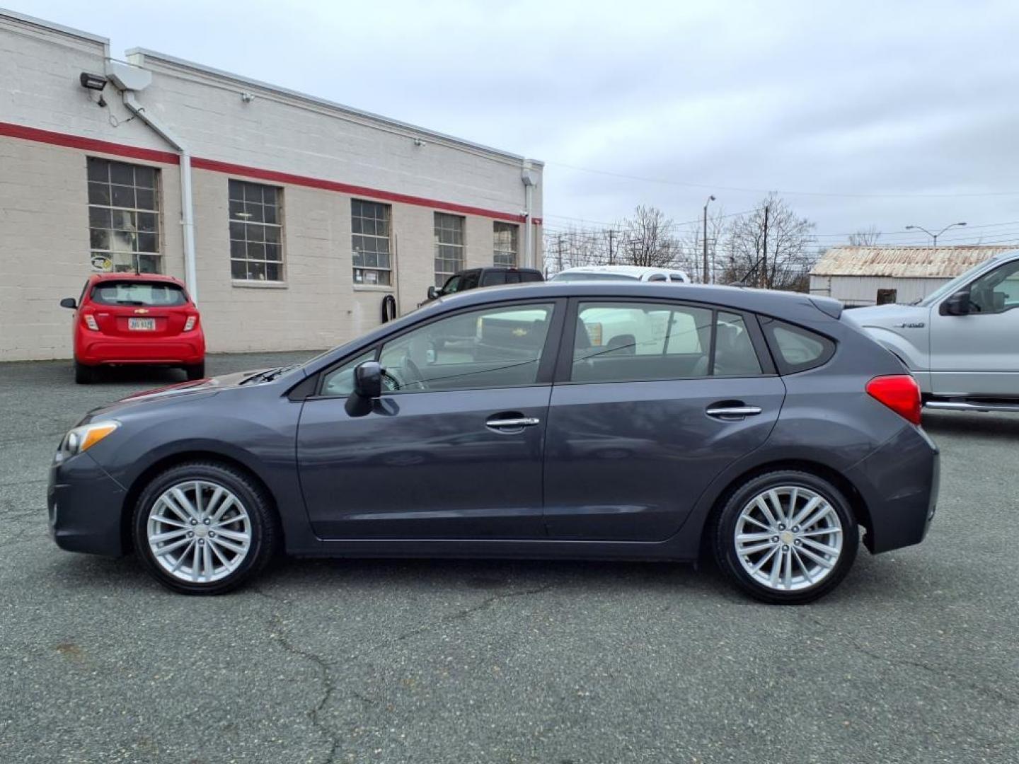 2012 Gray Subaru Impreza 2.0i Limited (JF1GPAH67CH) with an 2.0L 4 Cylinder Sequential-Port F.I. engine, ATAWD transmission, located at 50 Eastern Blvd., Essex, MD, 21221, (410) 686-3444, 39.304367, -76.484947 - Photo#1