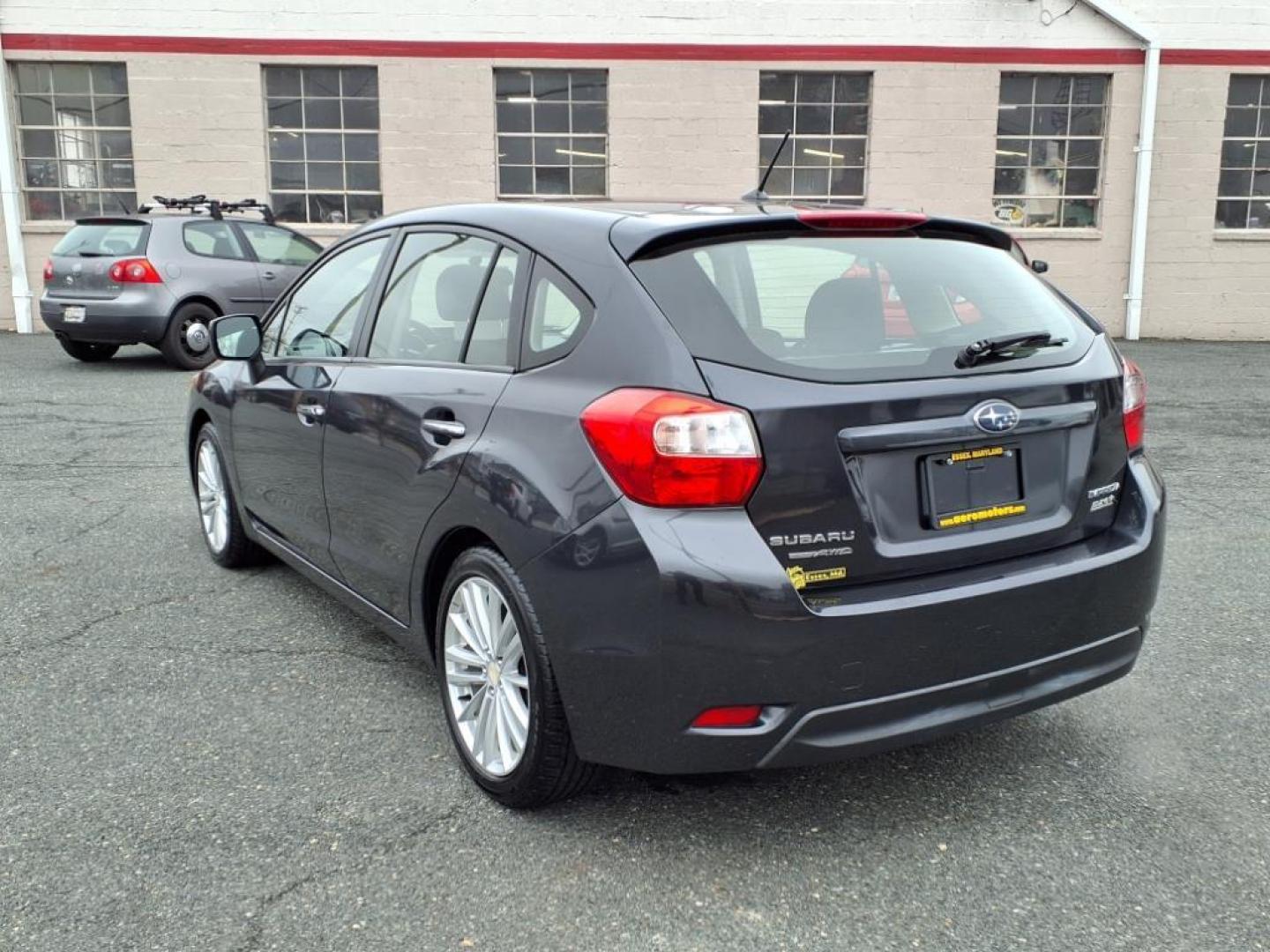 2012 Gray Subaru Impreza 2.0i Limited (JF1GPAH67CH) with an 2.0L 4 Cylinder Sequential-Port F.I. engine, ATAWD transmission, located at 50 Eastern Blvd., Essex, MD, 21221, (410) 686-3444, 39.304367, -76.484947 - Photo#2