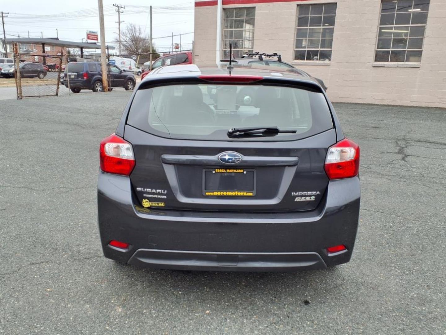 2012 Gray Subaru Impreza 2.0i Limited (JF1GPAH67CH) with an 2.0L 4 Cylinder Sequential-Port F.I. engine, ATAWD transmission, located at 50 Eastern Blvd., Essex, MD, 21221, (410) 686-3444, 39.304367, -76.484947 - Photo#3