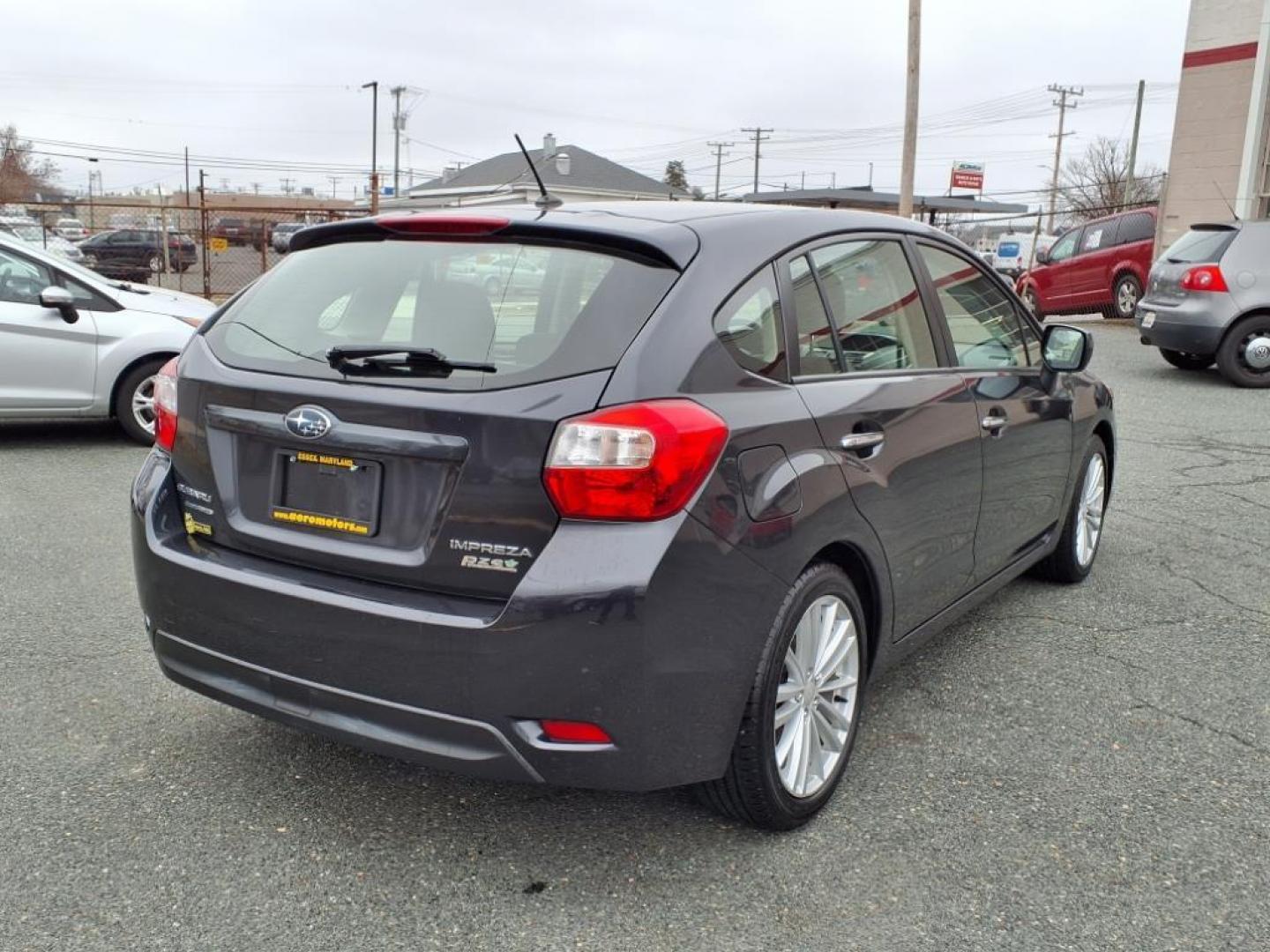2012 Gray Subaru Impreza 2.0i Limited (JF1GPAH67CH) with an 2.0L 4 Cylinder Sequential-Port F.I. engine, ATAWD transmission, located at 50 Eastern Blvd., Essex, MD, 21221, (410) 686-3444, 39.304367, -76.484947 - Photo#4