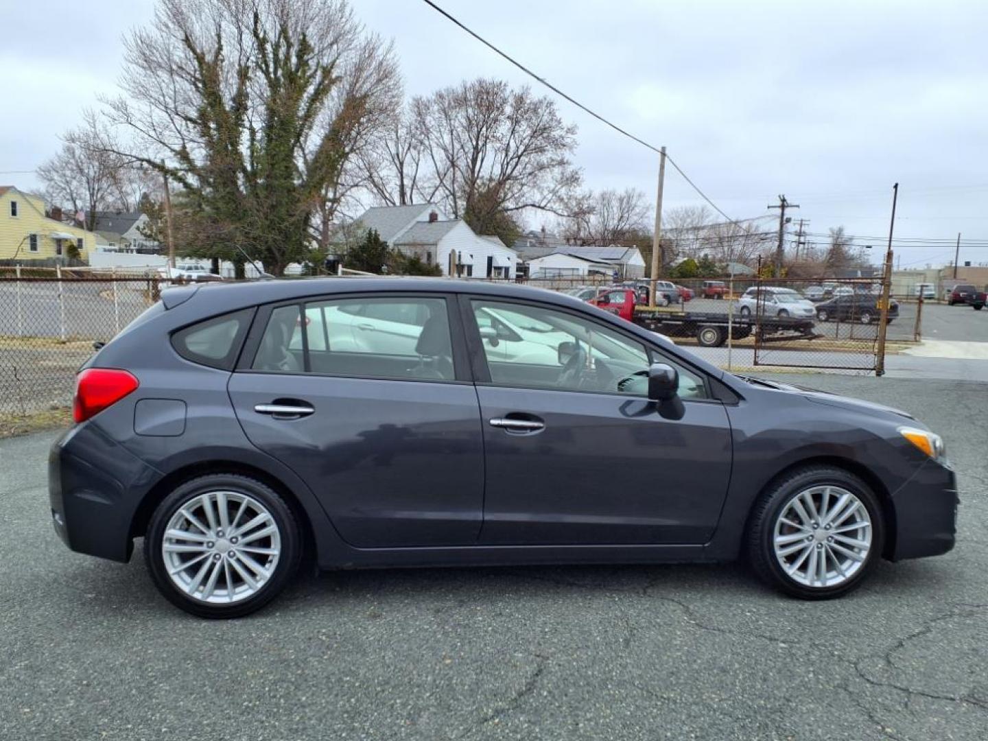 2012 Gray Subaru Impreza 2.0i Limited (JF1GPAH67CH) with an 2.0L 4 Cylinder Sequential-Port F.I. engine, ATAWD transmission, located at 50 Eastern Blvd., Essex, MD, 21221, (410) 686-3444, 39.304367, -76.484947 - Photo#5