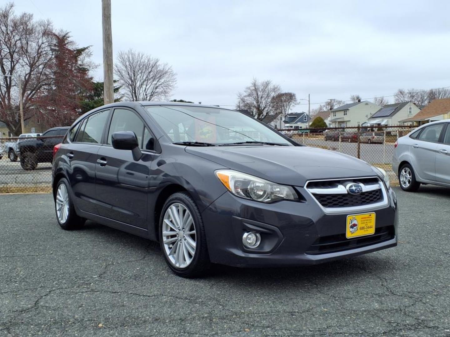 2012 Gray Subaru Impreza 2.0i Limited (JF1GPAH67CH) with an 2.0L 4 Cylinder Sequential-Port F.I. engine, ATAWD transmission, located at 50 Eastern Blvd., Essex, MD, 21221, (410) 686-3444, 39.304367, -76.484947 - Photo#6