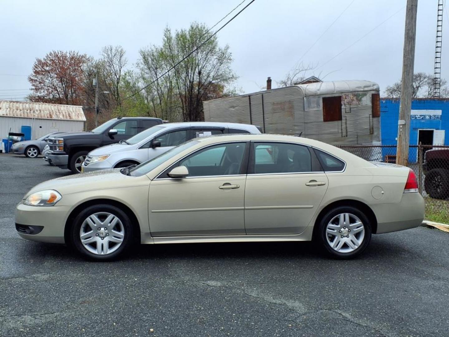2011 Gold Mist Metallic Chevrolet Impala LT (2G1WB5EKXB1) with an 3.5L 6 Cylinder Fuel Injected engine, Automatic transmission, located at 50 Eastern Blvd., Essex, MD, 21221, (410) 686-3444, 39.304367, -76.484947 - Photo#1