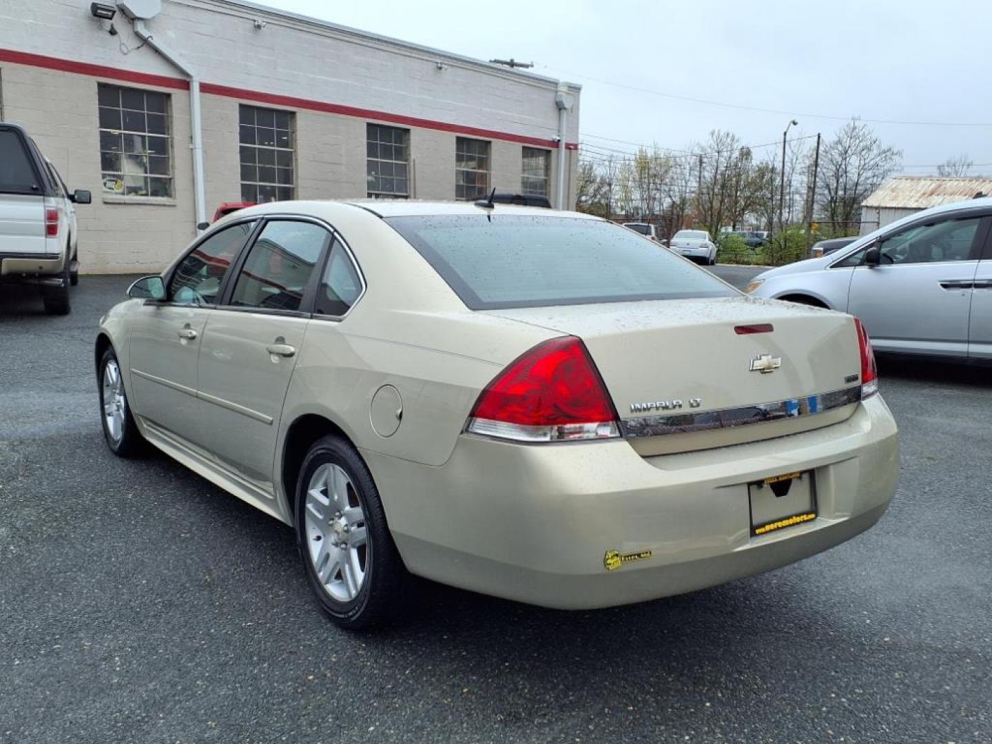 2011 Gold Mist Metallic Chevrolet Impala LT (2G1WB5EKXB1) with an 3.5L 6 Cylinder Fuel Injected engine, Automatic transmission, located at 50 Eastern Blvd., Essex, MD, 21221, (410) 686-3444, 39.304367, -76.484947 - Photo#2