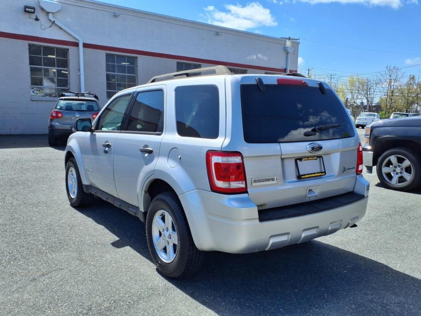 2011 Ingot Silver Metallic Ford Escape Hybrid Base (1FMCU5K30BK) with an 2.5L 2.5L Hybrid I4 153hp 136ft. lbs. Sequential-Port F.I. engine, CVT transmission, located at 50 Eastern Blvd., Essex, MD, 21221, (410) 686-3444, 39.304367, -76.484947 - Photo#2