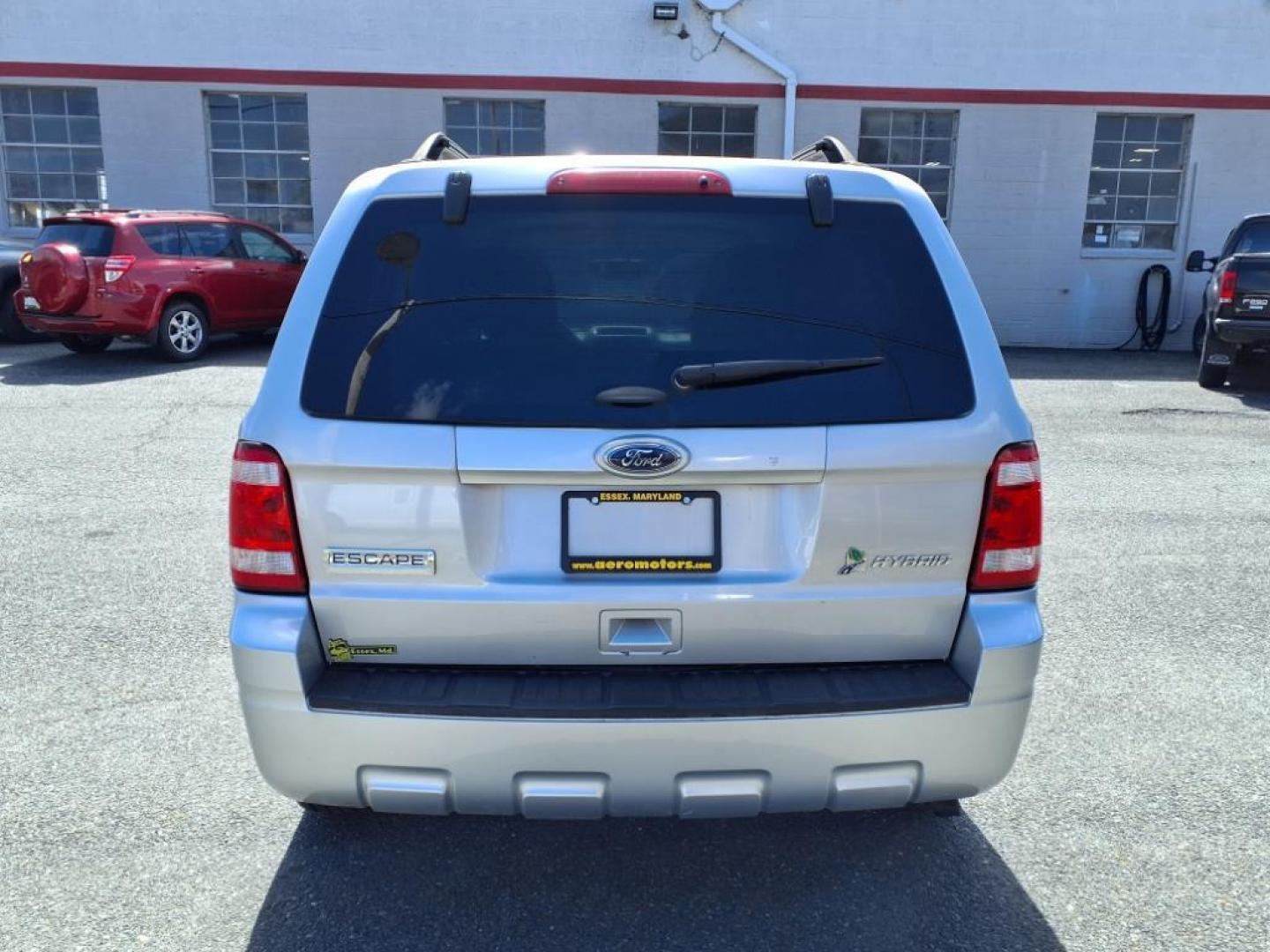 2011 Ingot Silver Metallic Ford Escape Hybrid Base (1FMCU5K30BK) with an 2.5L 2.5L Hybrid I4 153hp 136ft. lbs. Sequential-Port F.I. engine, CVT transmission, located at 50 Eastern Blvd., Essex, MD, 21221, (410) 686-3444, 39.304367, -76.484947 - Photo#3
