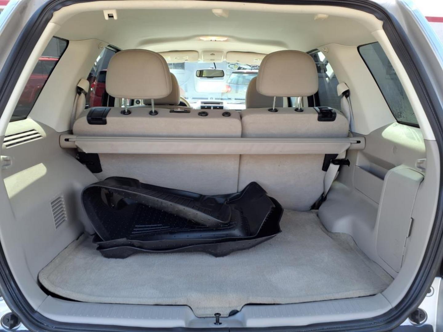 2011 Ingot Silver Metallic Ford Escape Hybrid Base (1FMCU5K30BK) with an 2.5L 2.5L Hybrid I4 153hp 136ft. lbs. Sequential-Port F.I. engine, CVT transmission, located at 50 Eastern Blvd., Essex, MD, 21221, (410) 686-3444, 39.304367, -76.484947 - Photo#4