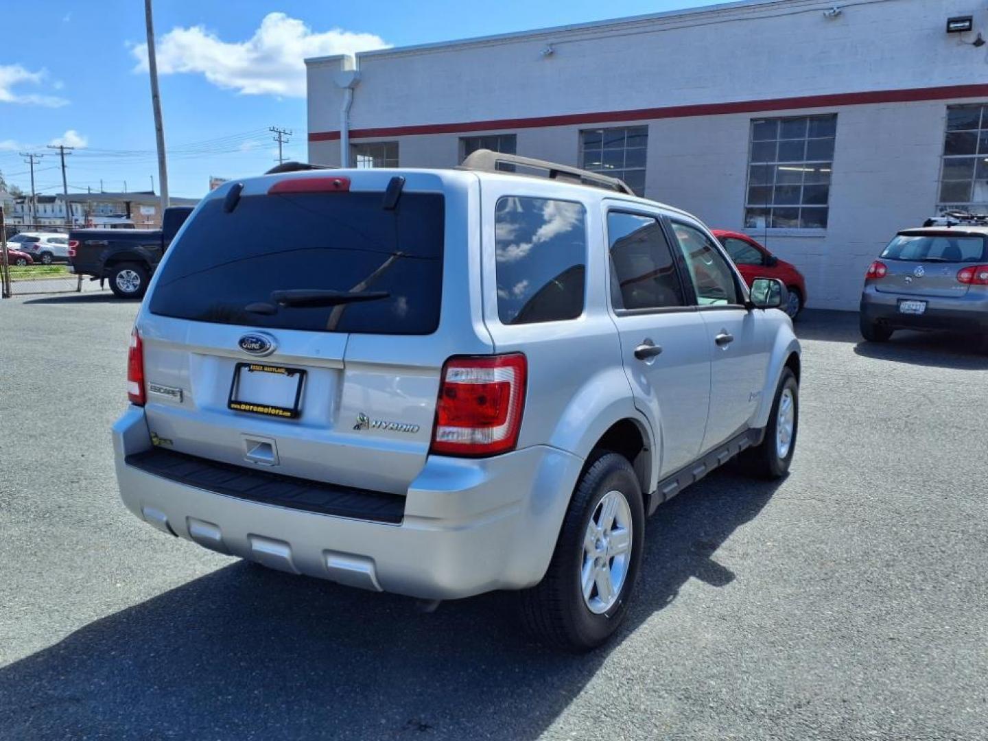 2011 Ingot Silver Metallic Ford Escape Hybrid Base (1FMCU5K30BK) with an 2.5L 2.5L Hybrid I4 153hp 136ft. lbs. Sequential-Port F.I. engine, CVT transmission, located at 50 Eastern Blvd., Essex, MD, 21221, (410) 686-3444, 39.304367, -76.484947 - Photo#5