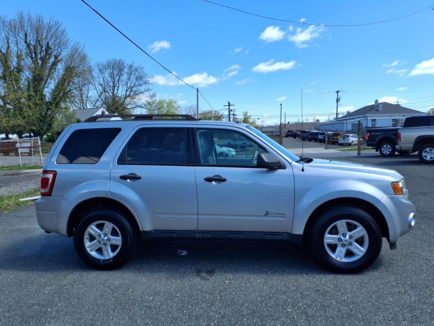 2011 Ingot Silver Metallic Ford Escape Hybrid Base (1FMCU5K30BK) with an 2.5L 2.5L Hybrid I4 153hp 136ft. lbs. Sequential-Port F.I. engine, CVT transmission, located at 50 Eastern Blvd., Essex, MD, 21221, (410) 686-3444, 39.304367, -76.484947 - Photo#6