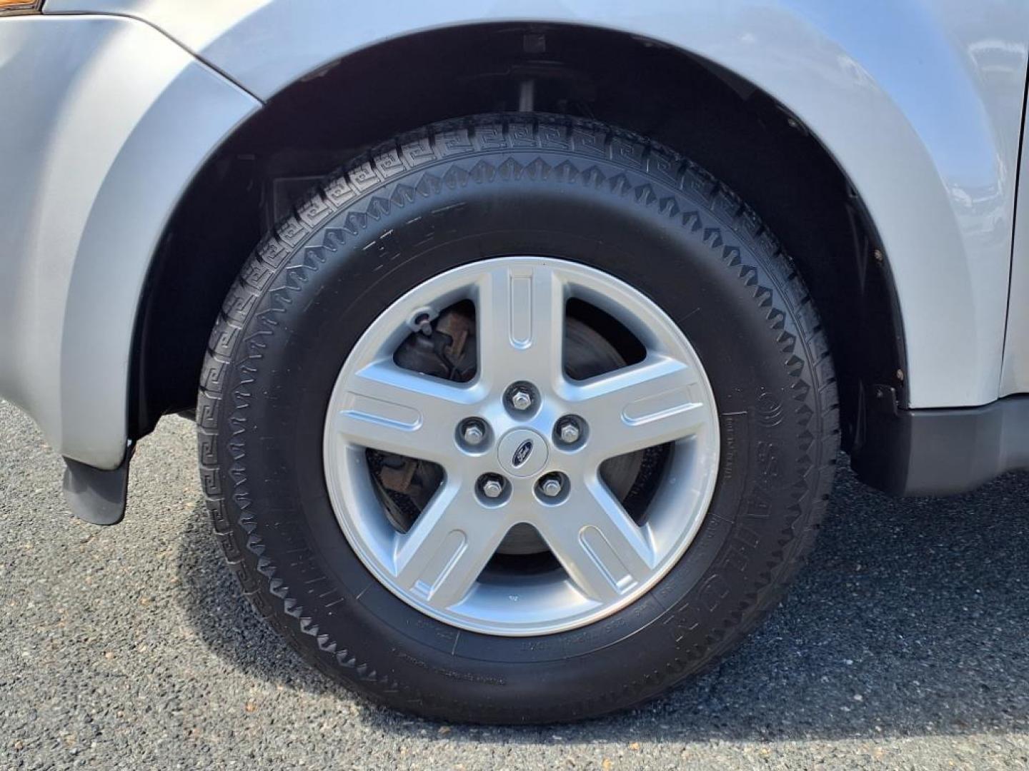 2011 Ingot Silver Metallic Ford Escape Hybrid Base (1FMCU5K30BK) with an 2.5L 2.5L Hybrid I4 153hp 136ft. lbs. Sequential-Port F.I. engine, CVT transmission, located at 50 Eastern Blvd., Essex, MD, 21221, (410) 686-3444, 39.304367, -76.484947 - Photo#9