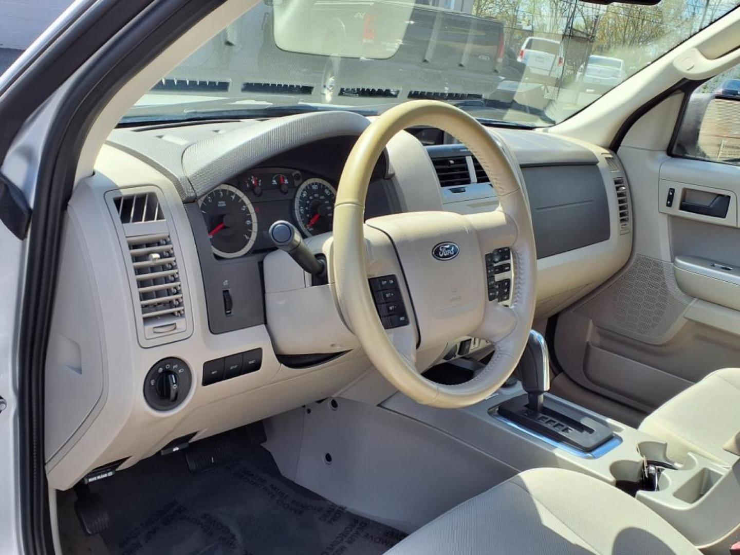 2011 Ingot Silver Metallic Ford Escape Hybrid Base (1FMCU5K30BK) with an 2.5L 2.5L Hybrid I4 153hp 136ft. lbs. Sequential-Port F.I. engine, CVT transmission, located at 50 Eastern Blvd., Essex, MD, 21221, (410) 686-3444, 39.304367, -76.484947 - Photo#11