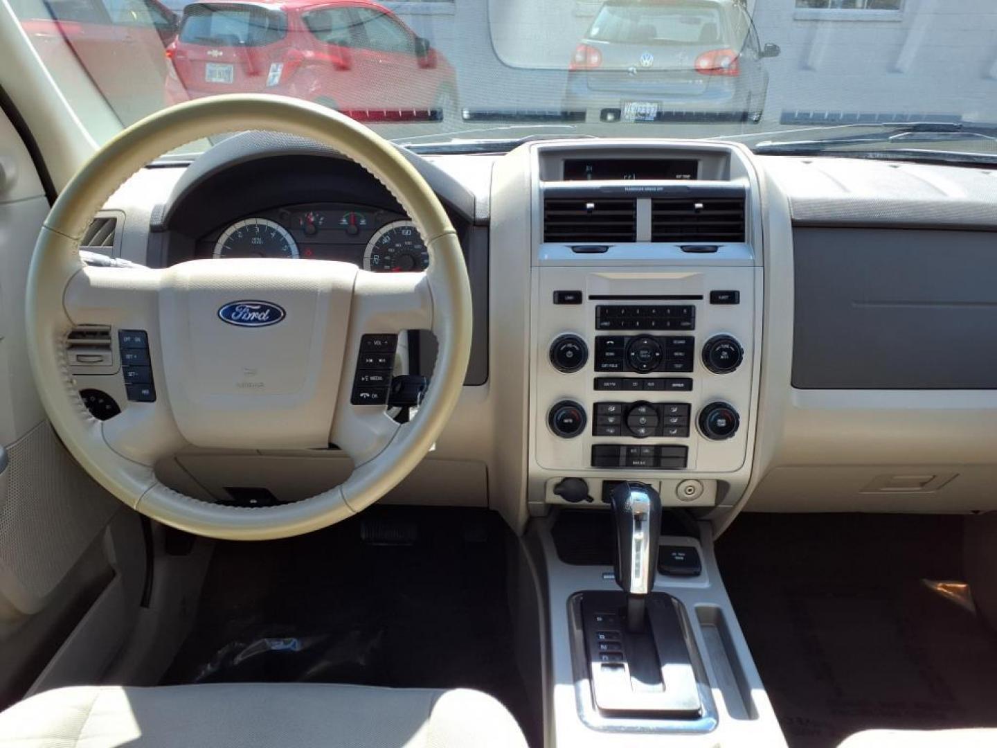 2011 Ingot Silver Metallic Ford Escape Hybrid Base (1FMCU5K30BK) with an 2.5L 2.5L Hybrid I4 153hp 136ft. lbs. Sequential-Port F.I. engine, CVT transmission, located at 50 Eastern Blvd., Essex, MD, 21221, (410) 686-3444, 39.304367, -76.484947 - Photo#15
