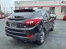 2015 Ash Black Hyundai TUCSON Limited (KM8JUCAG6FU) with an 2.4L 2.4L I4 182hp 177ft. lbs. Fuel Injected engine, 6-Speed Shiftable Automatic transmission, located at 50 Eastern Blvd., Essex, MD, 21221, (410) 686-3444, 39.304367, -76.484947 - Photo#5