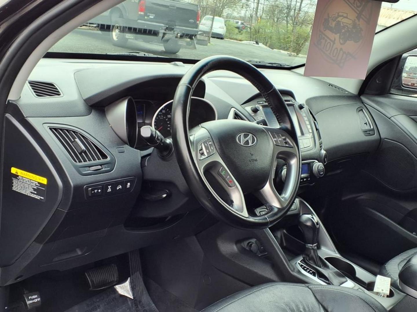 2015 Ash Black Hyundai TUCSON Limited (KM8JUCAG6FU) with an 2.4L 2.4L I4 182hp 177ft. lbs. Fuel Injected engine, 6-Speed Shiftable Automatic transmission, located at 50 Eastern Blvd., Essex, MD, 21221, (410) 686-3444, 39.304367, -76.484947 - Photo#11