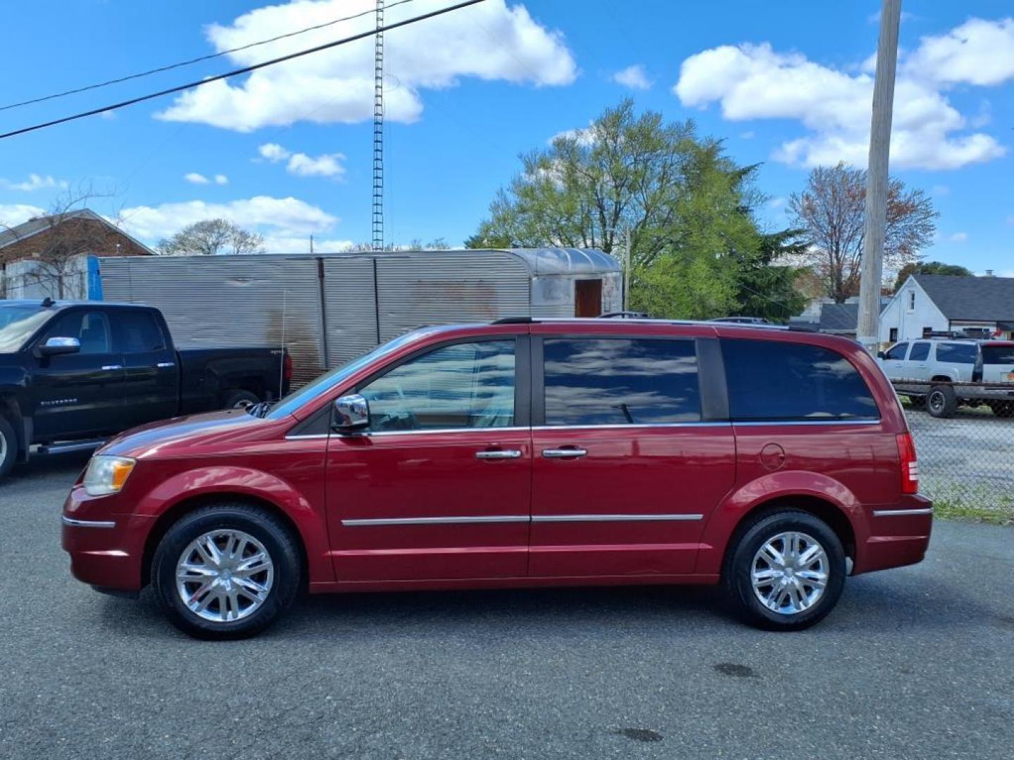 2010 Deep Cherry Red Crystal Pearl Coat Chrysler Town and Country Limited (2A4RR7DX2AR) with an 4.0L 6 Cylinder Sequential-Port F.I. engine, Automatic transmission, located at 50 Eastern Blvd., Essex, MD, 21221, (410) 686-3444, 39.304367, -76.484947 - Photo#1