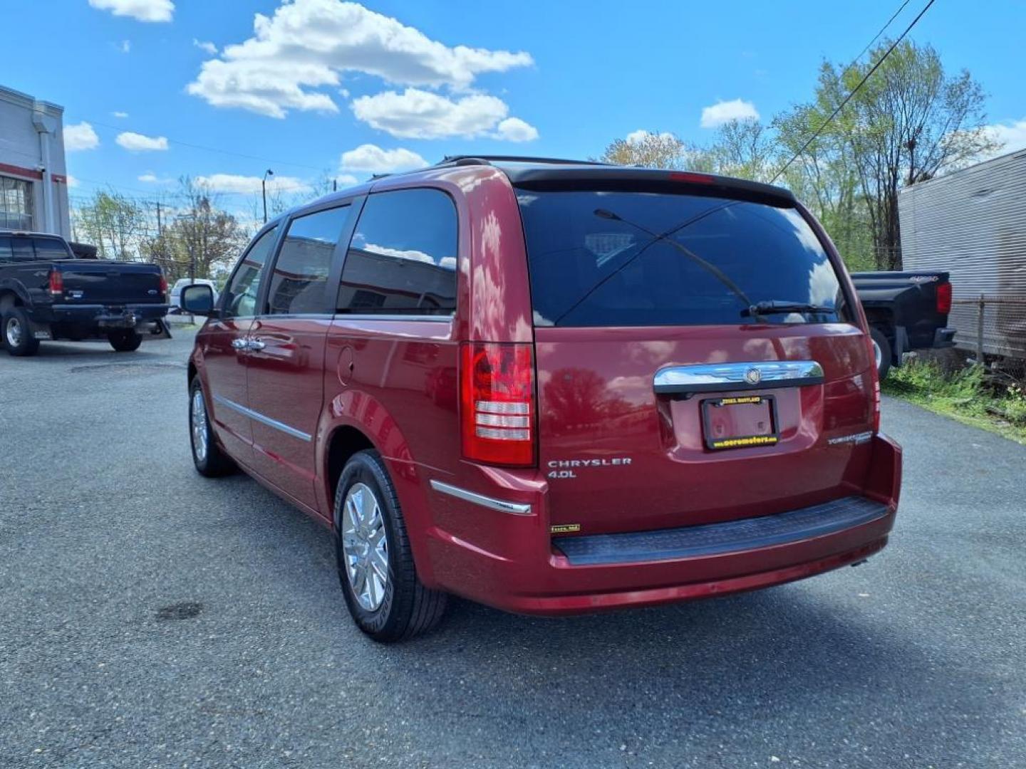 2010 Deep Cherry Red Crystal Pearl Coat Chrysler Town and Country Limited (2A4RR7DX2AR) with an 4.0L 6 Cylinder Sequential-Port F.I. engine, Automatic transmission, located at 50 Eastern Blvd., Essex, MD, 21221, (410) 686-3444, 39.304367, -76.484947 - Photo#2