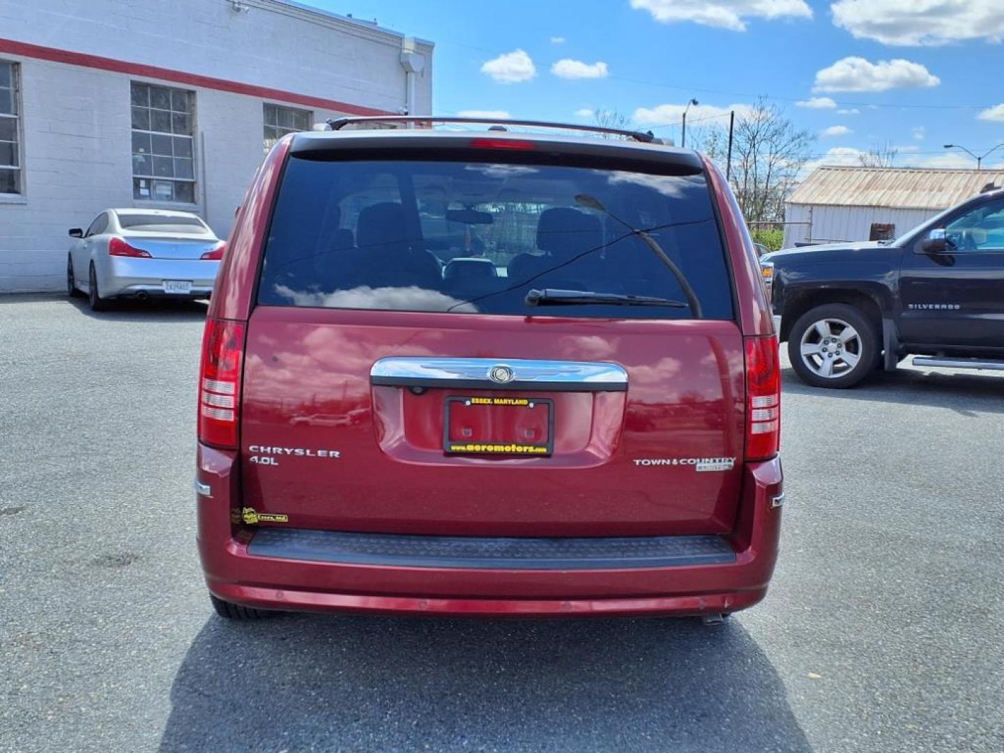 2010 Deep Cherry Red Crystal Pearl Coat Chrysler Town and Country Limited (2A4RR7DX2AR) with an 4.0L 6 Cylinder Sequential-Port F.I. engine, Automatic transmission, located at 50 Eastern Blvd., Essex, MD, 21221, (410) 686-3444, 39.304367, -76.484947 - Photo#3