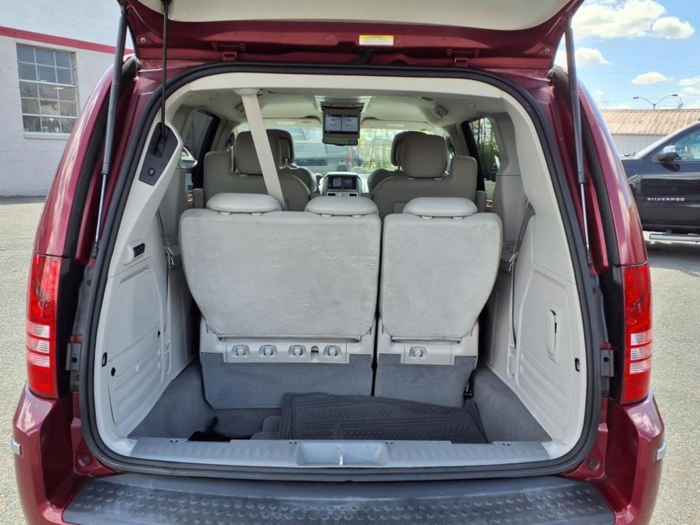 2010 Deep Cherry Red Crystal Pearl Coat Chrysler Town and Country Limited (2A4RR7DX2AR) with an 4.0L 6 Cylinder Sequential-Port F.I. engine, Automatic transmission, located at 50 Eastern Blvd., Essex, MD, 21221, (410) 686-3444, 39.304367, -76.484947 - Photo#4
