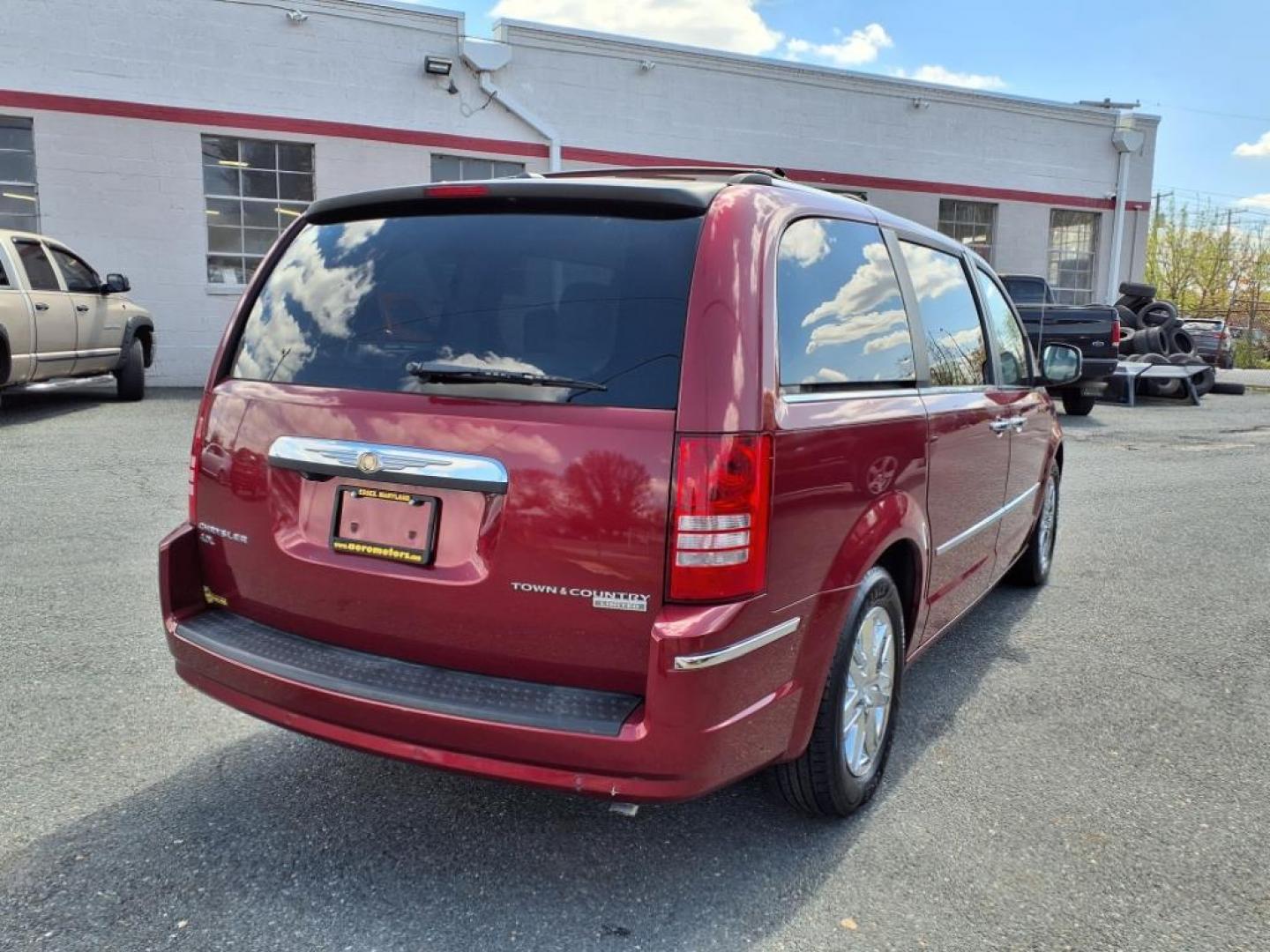 2010 Deep Cherry Red Crystal Pearl Coat Chrysler Town and Country Limited (2A4RR7DX2AR) with an 4.0L 6 Cylinder Sequential-Port F.I. engine, Automatic transmission, located at 50 Eastern Blvd., Essex, MD, 21221, (410) 686-3444, 39.304367, -76.484947 - Photo#5