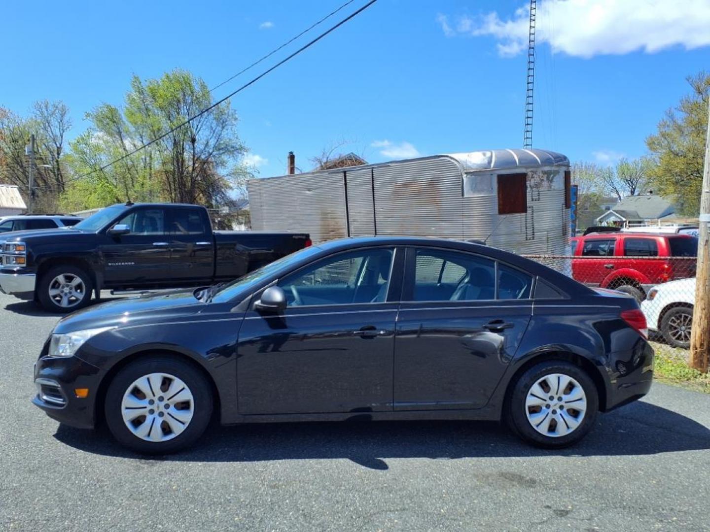 2016 Black Granite Metallic Chevrolet Cruze LS Auto (1G1PC5SH9G7) with an 1.8L Ecotec 1.8L Flex Fuel I4 138hp 125ft. lbs. Sequential-Port F.I. engine, 6-Speed Shiftable Automatic w/Overdrive transmission, located at 50 Eastern Blvd., Essex, MD, 21221, (410) 686-3444, 39.304367, -76.484947 - Photo#1