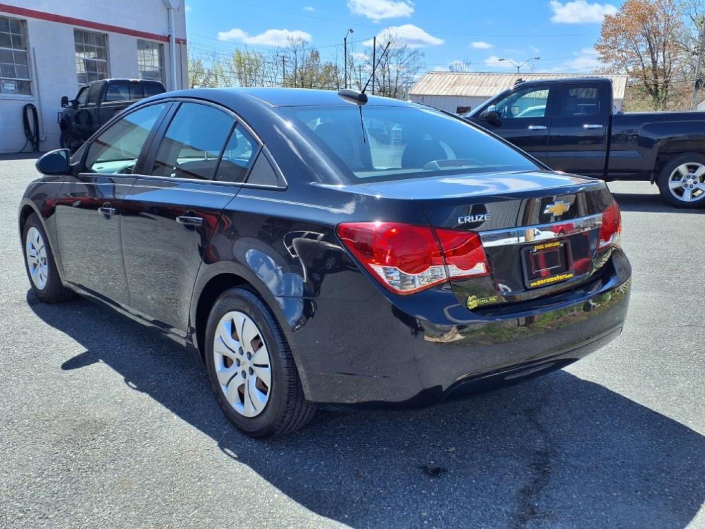 2016 Black Granite Metallic Chevrolet Cruze LS Auto (1G1PC5SH9G7) with an 1.8L Ecotec 1.8L Flex Fuel I4 138hp 125ft. lbs. Sequential-Port F.I. engine, 6-Speed Shiftable Automatic w/Overdrive transmission, located at 50 Eastern Blvd., Essex, MD, 21221, (410) 686-3444, 39.304367, -76.484947 - Photo#2