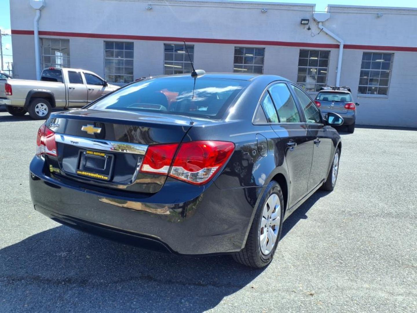 2016 Black Granite Metallic Chevrolet Cruze LS Auto (1G1PC5SH9G7) with an 1.8L Ecotec 1.8L Flex Fuel I4 138hp 125ft. lbs. Sequential-Port F.I. engine, 6-Speed Shiftable Automatic w/Overdrive transmission, located at 50 Eastern Blvd., Essex, MD, 21221, (410) 686-3444, 39.304367, -76.484947 - Photo#4