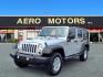 2011 Bright Silver Metallic Clear Coat Jeep Wrangler Unlimited Sport (1J4BA3H19BL) with an 3.8L 3.8L V6 202hp 237ft. lbs. Sequential-Port F.I. engine, 6-Speed Manual transmission, located at 50 Eastern Blvd., Essex, MD, 21221, (410) 686-3444, 39.304367, -76.484947 - Photo#0