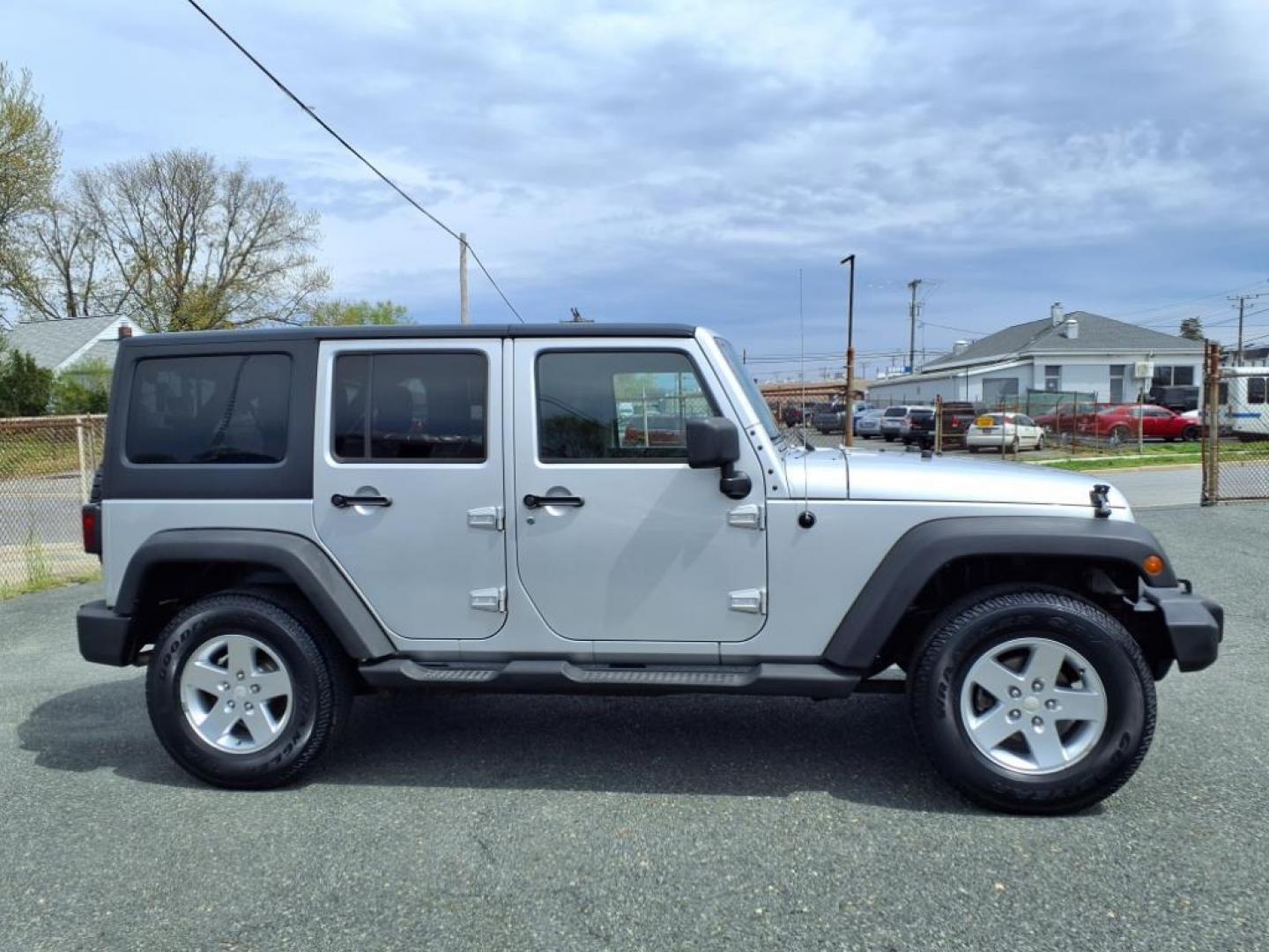 2011 Bright Silver Metallic Clear Coat Jeep Wrangler Unlimited Sport (1J4BA3H19BL) with an 3.8L 3.8L V6 202hp 237ft. lbs. Sequential-Port F.I. engine, 6-Speed Manual transmission, located at 50 Eastern Blvd., Essex, MD, 21221, (410) 686-3444, 39.304367, -76.484947 - Photo#6