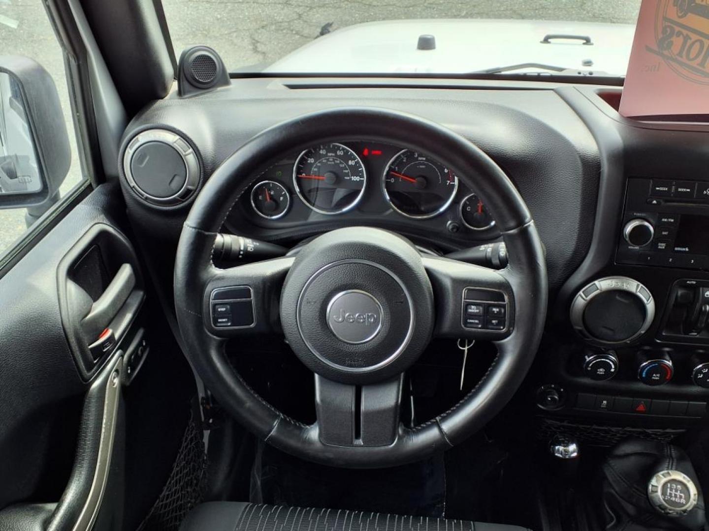 2011 Bright Silver Metallic Clear Coat Jeep Wrangler Unlimited Sport (1J4BA3H19BL) with an 3.8L 3.8L V6 202hp 237ft. lbs. Sequential-Port F.I. engine, 6-Speed Manual transmission, located at 50 Eastern Blvd., Essex, MD, 21221, (410) 686-3444, 39.304367, -76.484947 - Photo#14
