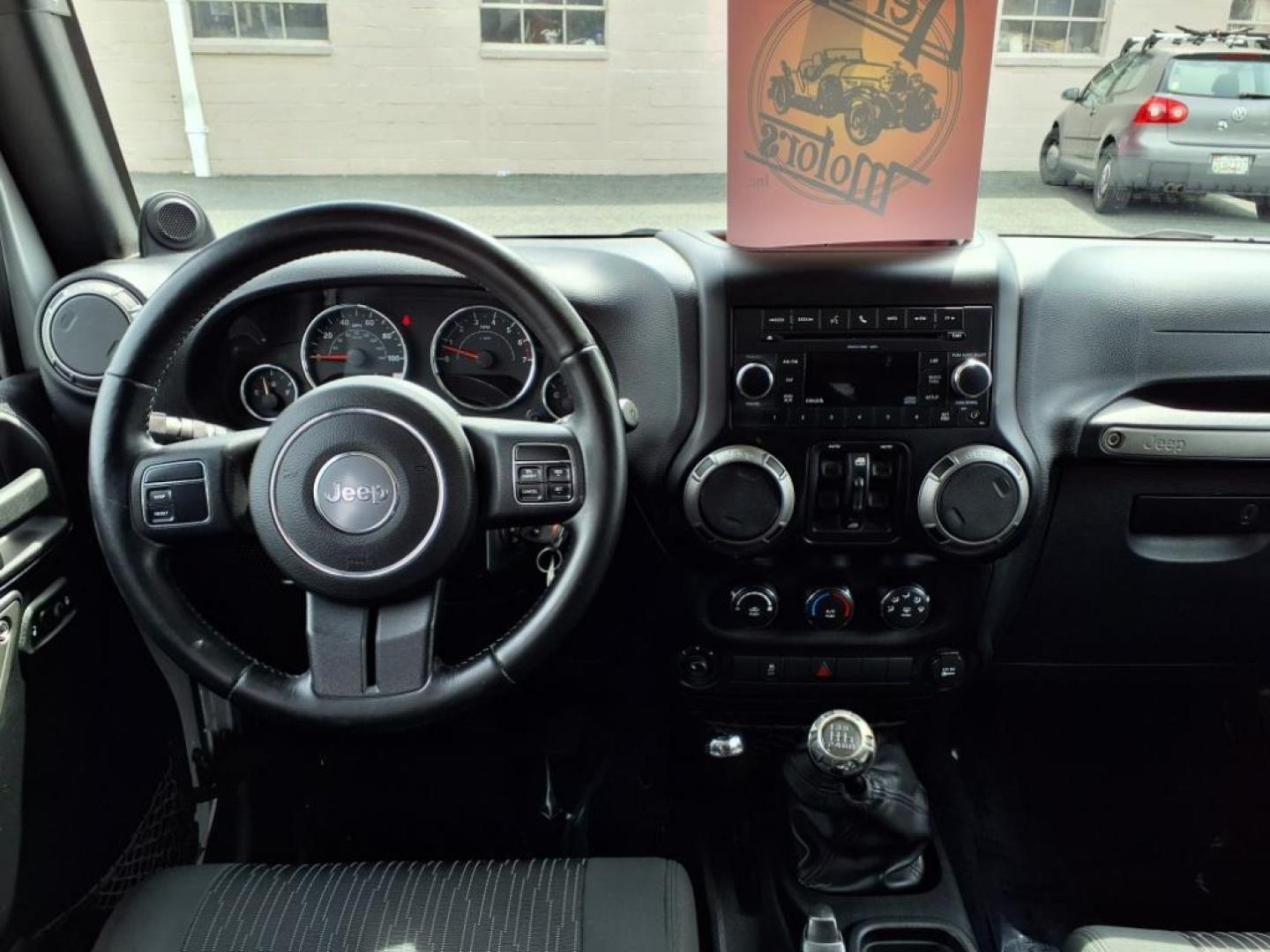 2011 Bright Silver Metallic Clear Coat Jeep Wrangler Unlimited Sport (1J4BA3H19BL) with an 3.8L 3.8L V6 202hp 237ft. lbs. Sequential-Port F.I. engine, 6-Speed Manual transmission, located at 50 Eastern Blvd., Essex, MD, 21221, (410) 686-3444, 39.304367, -76.484947 - Photo#15