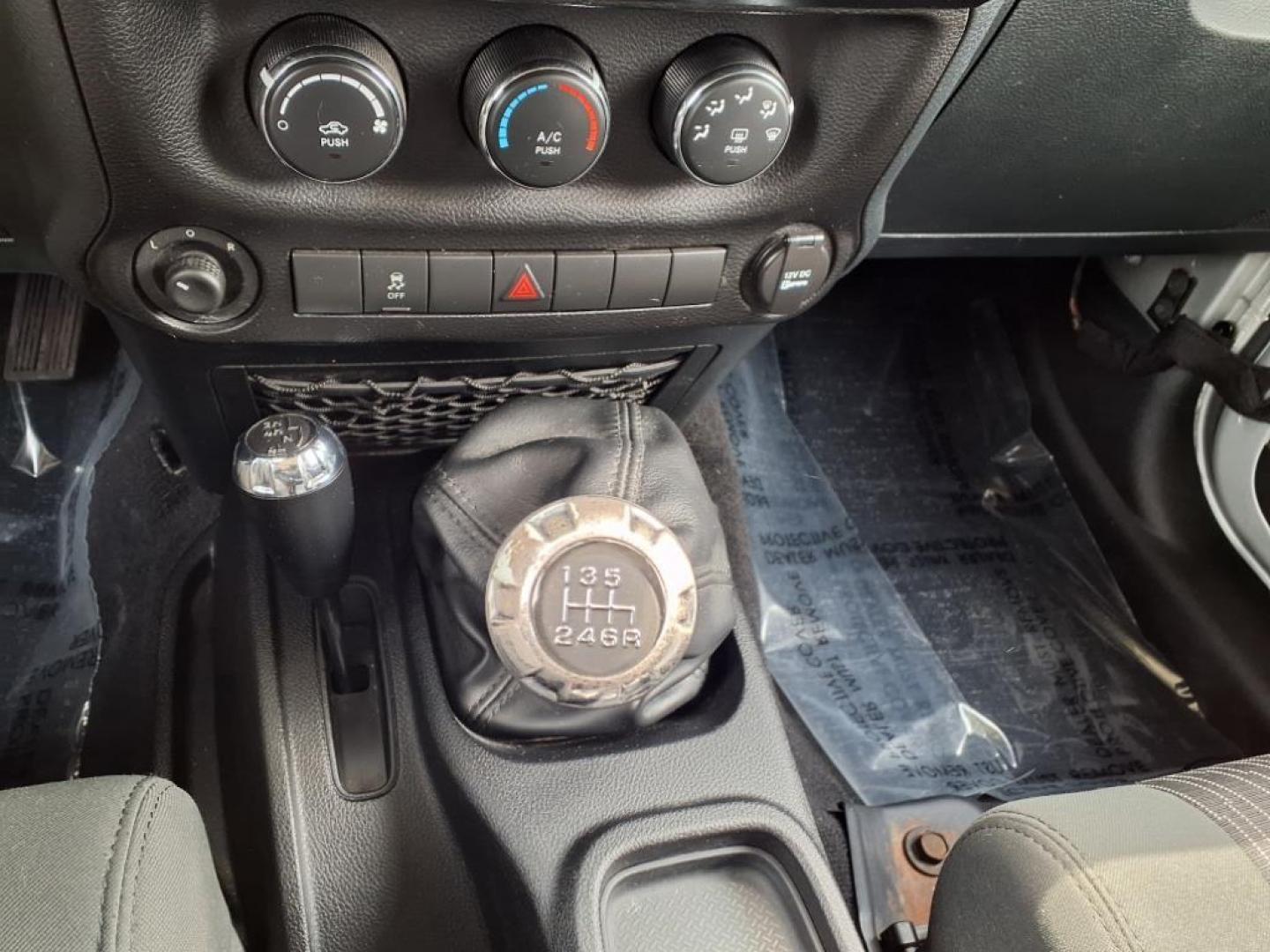 2011 Bright Silver Metallic Clear Coat Jeep Wrangler Unlimited Sport (1J4BA3H19BL) with an 3.8L 3.8L V6 202hp 237ft. lbs. Sequential-Port F.I. engine, 6-Speed Manual transmission, located at 50 Eastern Blvd., Essex, MD, 21221, (410) 686-3444, 39.304367, -76.484947 - Photo#18