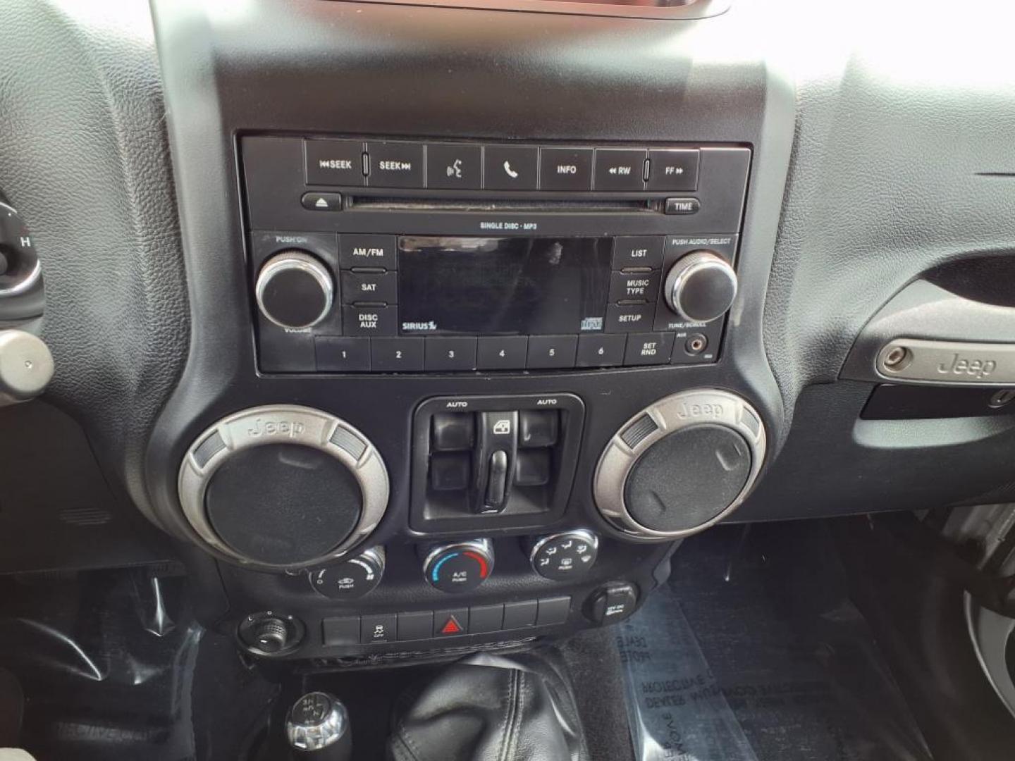 2011 Bright Silver Metallic Clear Coat Jeep Wrangler Unlimited Sport (1J4BA3H19BL) with an 3.8L 3.8L V6 202hp 237ft. lbs. Sequential-Port F.I. engine, 6-Speed Manual transmission, located at 50 Eastern Blvd., Essex, MD, 21221, (410) 686-3444, 39.304367, -76.484947 - Photo#19