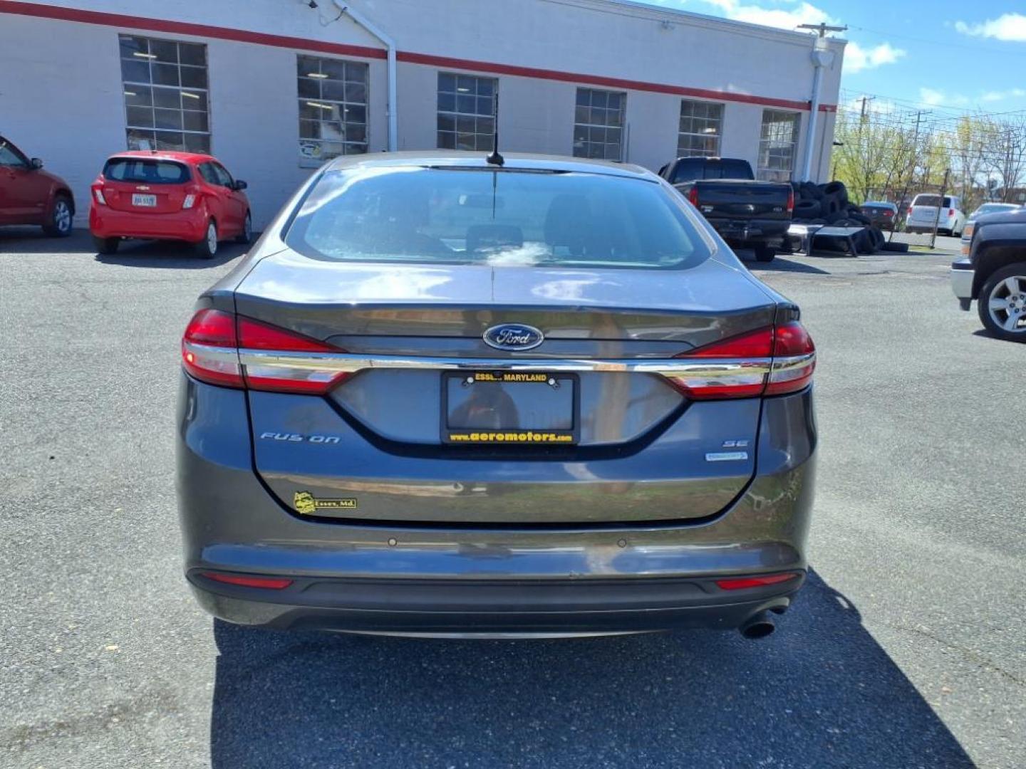 2017 Magnetic Ford Fusion SE (3FA6P0HD3HR) with an 1.5L 4 Cylinder Turbocharged engine, Automatic transmission, located at 50 Eastern Blvd., Essex, MD, 21221, (410) 686-3444, 39.304367, -76.484947 - Photo#3