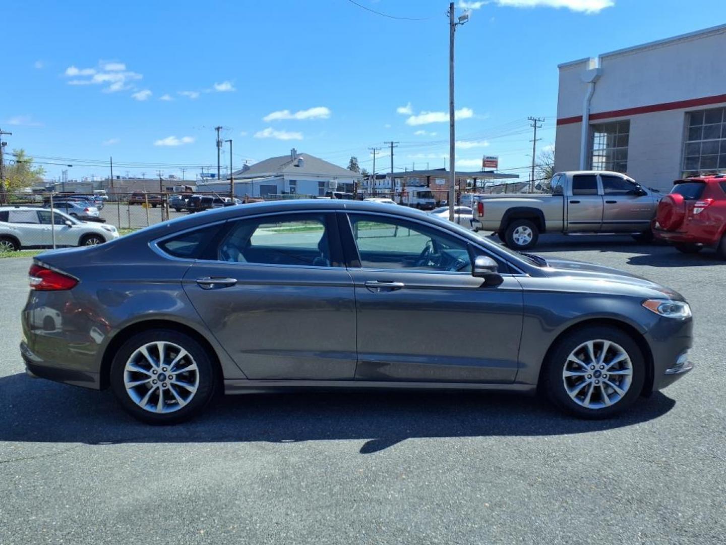 2017 Magnetic Ford Fusion SE (3FA6P0HD3HR) with an 1.5L 4 Cylinder Turbocharged engine, Automatic transmission, located at 50 Eastern Blvd., Essex, MD, 21221, (410) 686-3444, 39.304367, -76.484947 - Photo#5