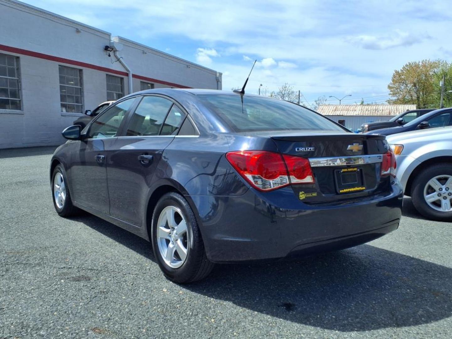 2014 Blue Ray Metallic Chevrolet Cruze 1LT Auto (1G1PC5SBXE7) with an 1.4L 4 Cylinder Sequential-Port F.I. engine, Automatic transmission, located at 50 Eastern Blvd., Essex, MD, 21221, (410) 686-3444, 39.304367, -76.484947 - Photo#2