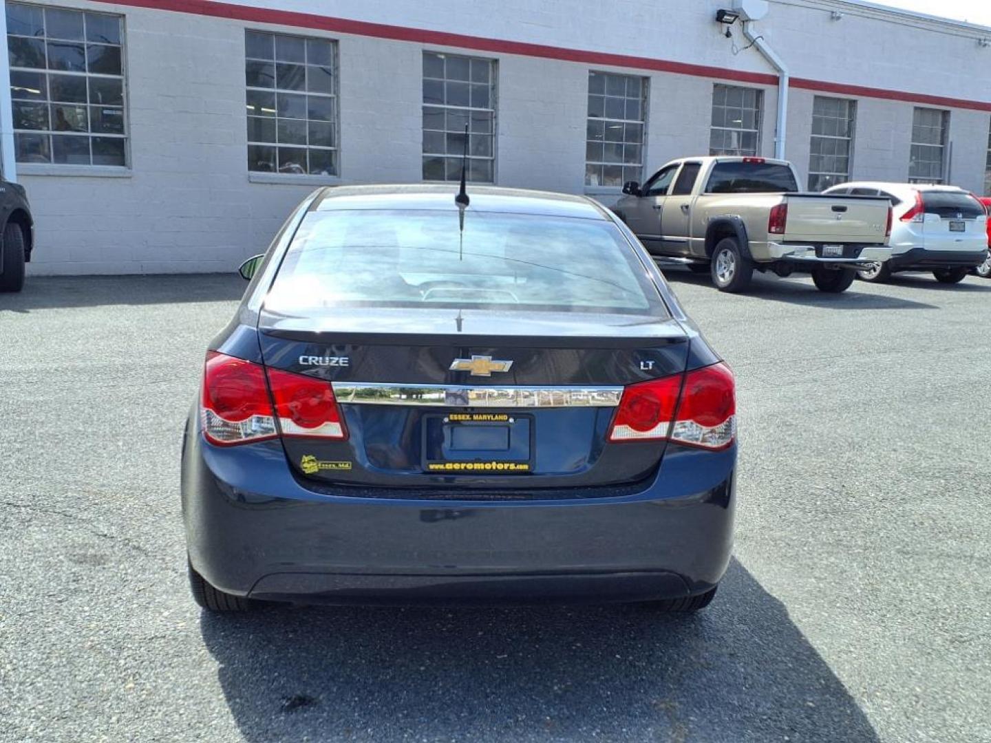 2014 Blue Ray Metallic Chevrolet Cruze 1LT Auto (1G1PC5SBXE7) with an 1.4L 4 Cylinder Sequential-Port F.I. engine, Automatic transmission, located at 50 Eastern Blvd., Essex, MD, 21221, (410) 686-3444, 39.304367, -76.484947 - Photo#3