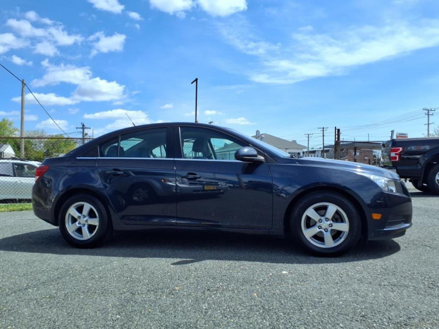 2014 Blue Ray Metallic Chevrolet Cruze 1LT Auto (1G1PC5SBXE7) with an 1.4L 4 Cylinder Sequential-Port F.I. engine, Automatic transmission, located at 50 Eastern Blvd., Essex, MD, 21221, (410) 686-3444, 39.304367, -76.484947 - Photo#5