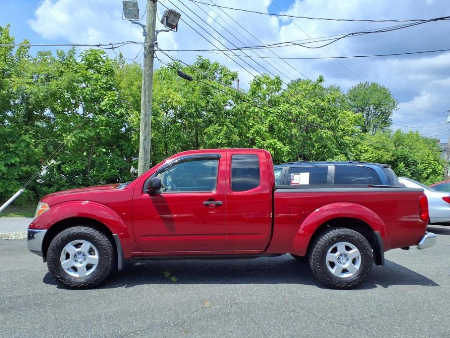 2008 Red Alert Nissan Frontier SE V6 (1N6AD06W08C) with an 4.0L 4.0L V6 261hp 281ft. lbs. Fuel Injected engine, 5-Speed Automatic transmission, located at 50 Eastern Blvd., Essex, MD, 21221, (410) 686-3444, 39.304367, -76.484947 - Photo#1